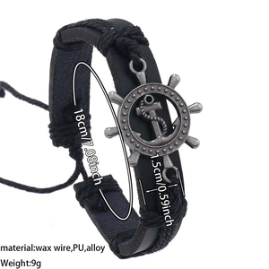 Detailed size chart of black braided leather nautical bracelet with rudder and anchor charms