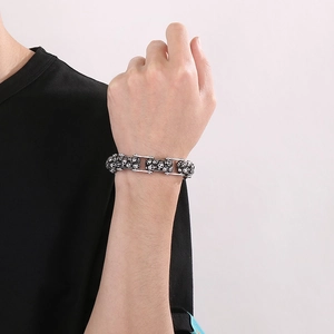 Men's retro stainless steel skull bicycle chain bracelet in punk style on wrist