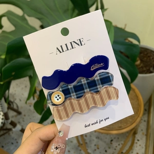 Three-piece wave-shaped hair clips set with retro red plaid patterns and buttons
