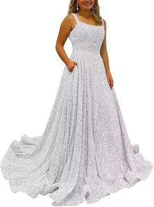 Macro detail of white sequined A-line evening gown featuring a thin strap and floor length
