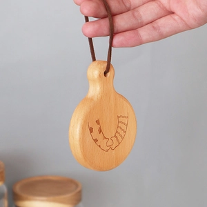 Creative wooden beer bottle opener with leather strap and feline paw engraving art