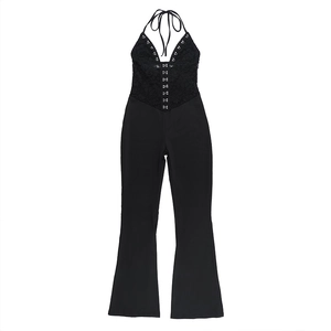 Detailed view of black halter neck jumpsuit with lace bodice and hook-and-eye closure