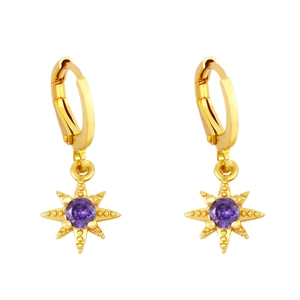 Golden starburst huggie earrings with purple zircon center on a clean white background