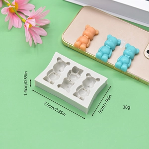 Three-hole bear silicone mold showing dimensions 7.5cm x 5cm x 1.4cm for DIY crafts