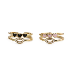 Detail of adjustable double-layer heart and lip rings in gold, black and pink finishes