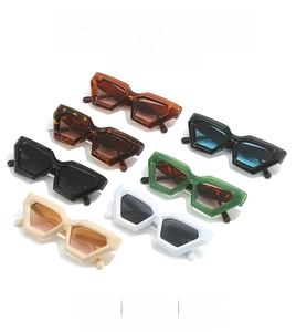 Detailed display of geometric cat-eye sunglasses in various colors with diamond-cut frames