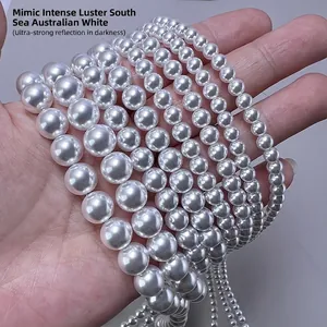 Lustrous white glass pearl beads in various sizes for DIY jewelry making and accessories