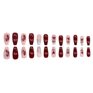 Long press-on nails with wine red tulip design and silver glitter on white background