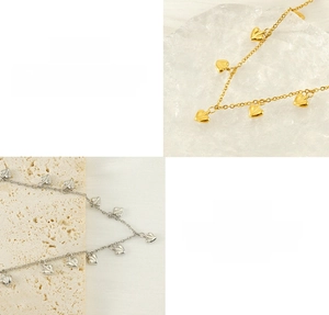 Detail view of 18K heart pendants on stainless steel O-chain in gold and silver