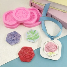 Detailed pink silicone molds showing floral rose patterns for DIY scented wax tablets