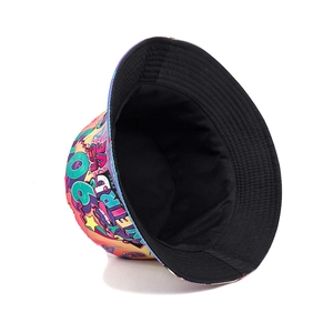 Retro 90s style reversible bucket hat with colorful pop art graffiti and street patterns