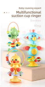 Close-up of baby suction cup spinning toys with cute dinosaur and bird cartoon shapes