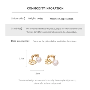 Detailed view of golden horse earrings with pearls and dimensions showing 2.5cm size