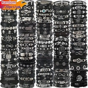 Matrix display of vintage leather bracelets with music symbols and metal charms