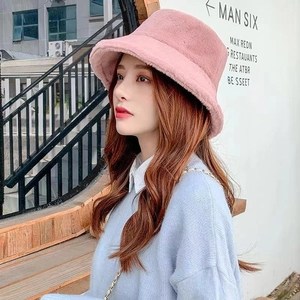 Pink faux rabbit fur bucket hat for women showing a stylish plush texture and cozy warm fit