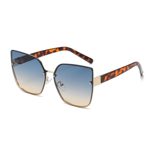 Stylish leopard print oversized cat-eye sunglasses with gradient lenses and metal bridge