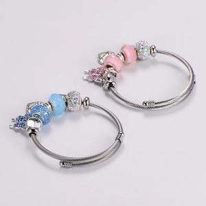 Adjustable stainless steel wire bracelet with blue and pink beads and heart pendants