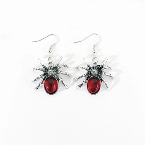 Vintage silver spider drop earrings with red crystal center in gothic punk style
