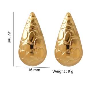 Golden teardrop stainless steel earrings with textured relief and 30mm height dimension