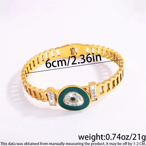 Detailed close-up of gold-plated Evil Eye bangle with dimensions 6cm and weight 21g