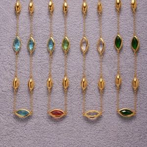 Faceted glass crystal necklaces with marquise cut stones on elegant gold chains