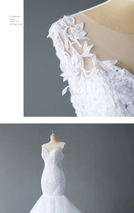 Detail of V-neck lace bridal gown with floral embroidery and elegant mermaid silhouette