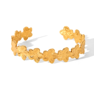 Bracelet jonc ouvert en acier inoxydable doré avec des motifs floraux à cinq pétales
