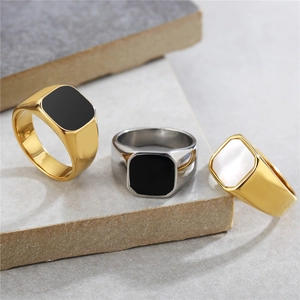 Minimalist square signet rings in gold and silver with black agate and white shell inlays