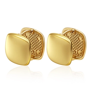 Detail of matte gold square hoop earrings with geometric mesh interior and polished finish
