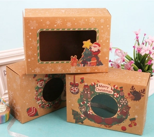 Detail of Christmas kraft paper gift boxes with PVC windows and festive holiday patterns