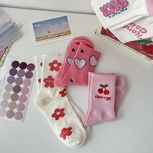 Pink mid-calf cotton socks with heart, flower, and cherry patterns in a soft aesthetic set