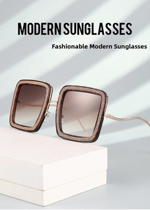 Close-up of square leopard print frame with gold glitter detail and gradient lenses