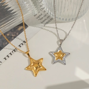 Fashionable bicolor star pendant necklaces in gold and silver finish on white background