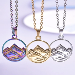 Mountain pendant necklaces in rainbow, gold, and silver finishes with fine chain