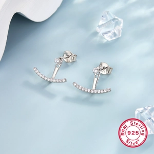 Minimalist S925 sterling silver smile earrings with white zircon on blue ice background