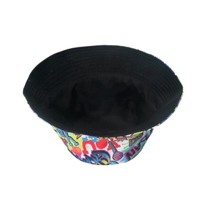 Detail of street style bucket hat featuring colorful retro graffiti prints and black lining