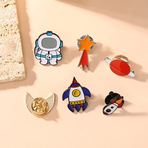 Detailed view of astronaut and space metal badges with colorful enamel coating set