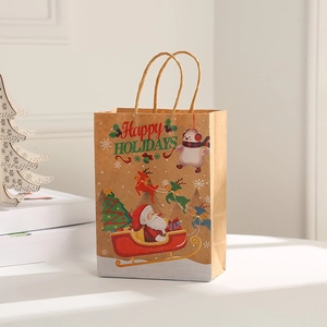 Close-up of brown kraft Christmas gift bag featuring Santa and Happy Holidays print