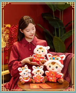 Festive Year of the Horse plush toys in Tang suit costumes held by a model in a warm setting