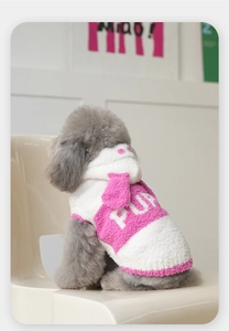 Close-up of soft flannel dog hoodie featuring 3D pink ears and white PUP letter embroidery