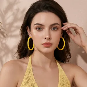 Vibrant yellow acrylic hoop earrings with a minimalist round geometric design for women