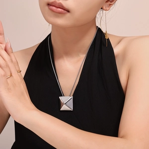 Chic 18k gold plated titanium necklace with a minimalist 3D pyramid pendant for women