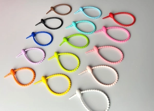 Detailed view of colorful 210mm flexible plastic cable ties and keychain organizer strips