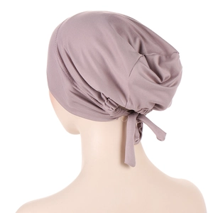 Rear view detail of dusty pink satin-lined hijab cap with adjustable back ties
