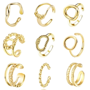 Set de 9 anillos y ear cuffs de acero inoxidable dorado con varios diseños modernos