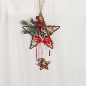 Christmas wooden star wreath with red berries, pine cones and festive ribbon ornament