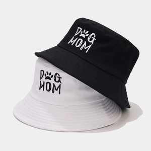 Two-pack of cotton bucket hats in black and white with DOG MOM embroidery and paw print