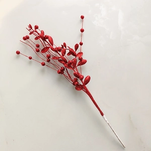 Close-up of sparkling red glitter berry branch for festive Christmas DIY decorations