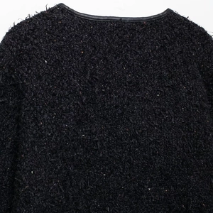 Veste élégante en tweed noir pour femme avec mouchetures colorées et bordure en cuir