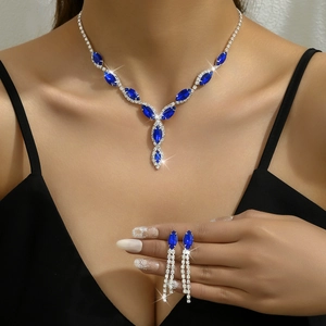 Elegant bridal jewelry set with navy blue marquise stones and diamond tassel earrings